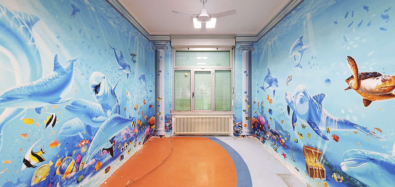 Under the sea themed wallpaper for children's hospital wall branding. 